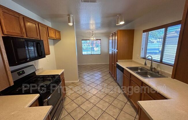 12521 W MYER LN