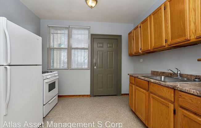 6001-05 S Whipple 3015-3021 W 60th St