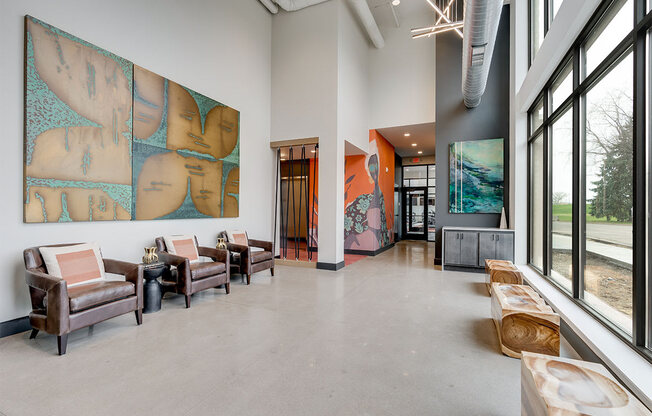 Lounge space with chairs and large windows