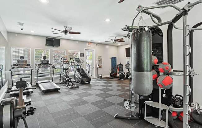 A well-equipped gym with a variety of exercise machines and equipment.
