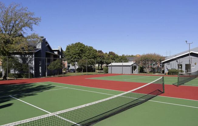 a tennis court with green and red lines on it