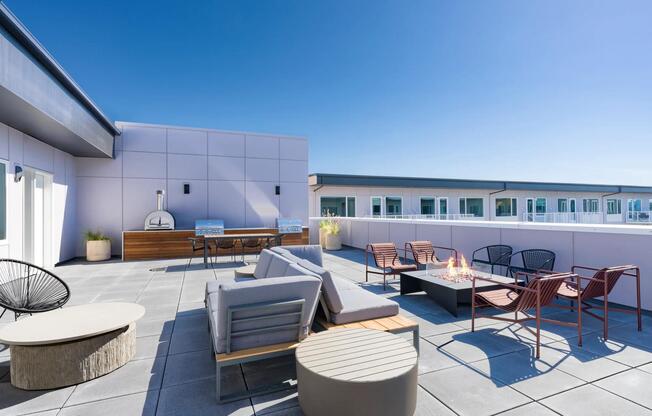 Unwind in style at Modera Raleigh Hills! Our 5th-floor outdoor deck offers cozy lounge seating and a fire table, perfect for relaxing evenings with stunning views.