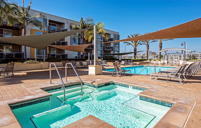 A swimming pool with a slide in the middle of it at Marina Harbor, California, 90292