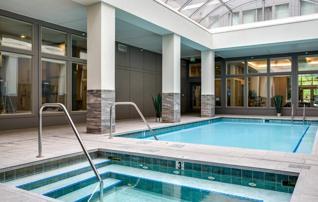 a swimming pool in the lobby of a hotel