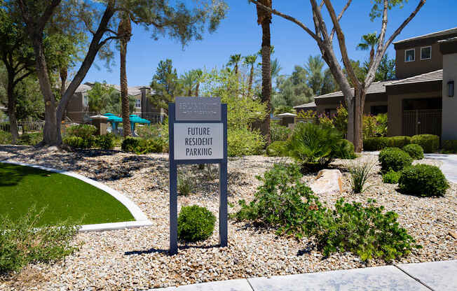 A sign in front of a building that says