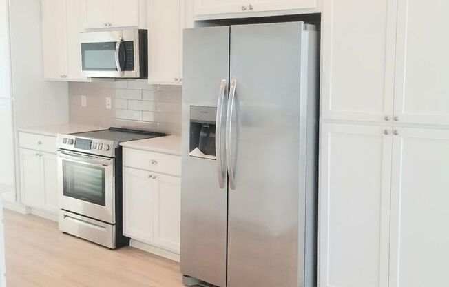 Brand New 3 Bedroom Townhome with Garage and In-Unit Laundry