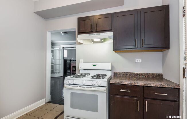 5039 S Champlain Ave / 635-639 E 50th Pl