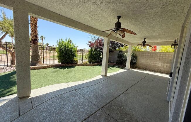 GORGEOUS 2 STORY HOME WITH A GRAND ENTRY & GOLF COURSE VIEW LOCATED INSIDE THE COMMUNITY OF RHODES RANCH