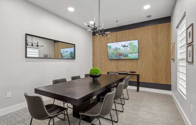 Conference room with seating and television