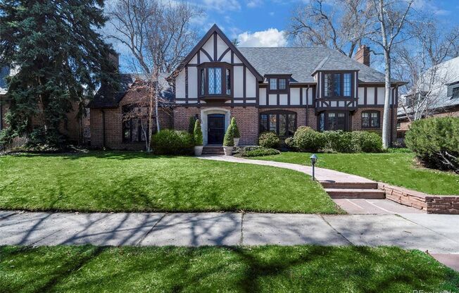 LOCATION LOCATION!! Exquisite English Tudor at the Denver Country Club located just 1 block away from Cherry Creek North!!