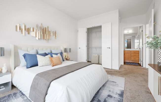 Bedroom area with cozy bed at 1500 Nicollet Apartment Homes, Minneapolis, MN, 55403