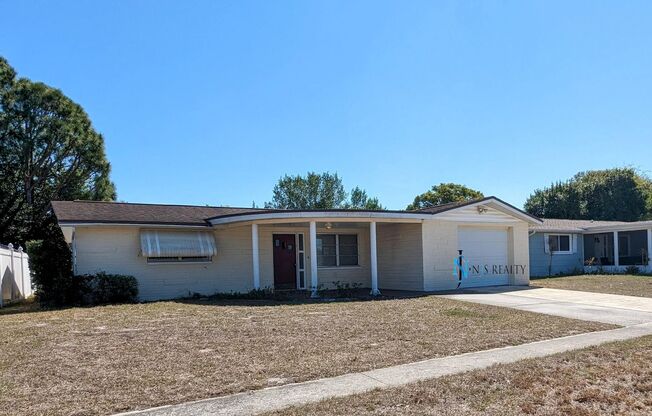 Gorgeous 2/1/1 1100 Sq. Ft. with HUGE kitchen/great room combo, tile floors throughout, BONUS ROOM & a fenced in yard!!!!