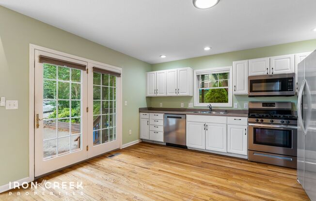 Charming Three-Bedroom Home with Solar Power and Fenced Yard in Asheville