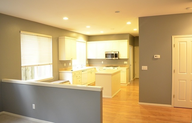 Beautifully Designed Home with Open Layout and Island Kitchen