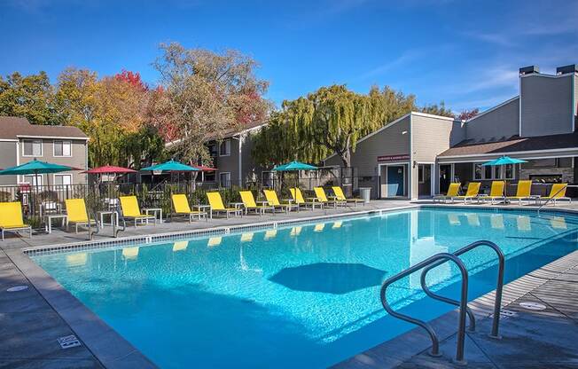 The Alexandar Pool with Lounge Chairs