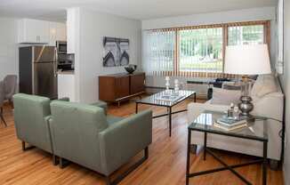 large windows, refinished hardwood floors