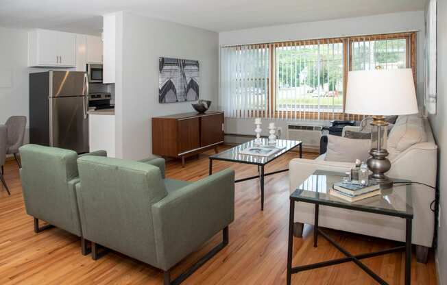 large windows, refinished hardwood floors