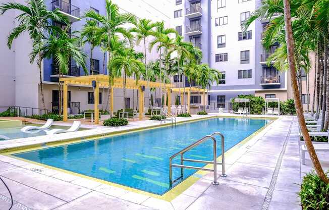 resort-inspired swimming pool at Berkshire Coral Gables apartments