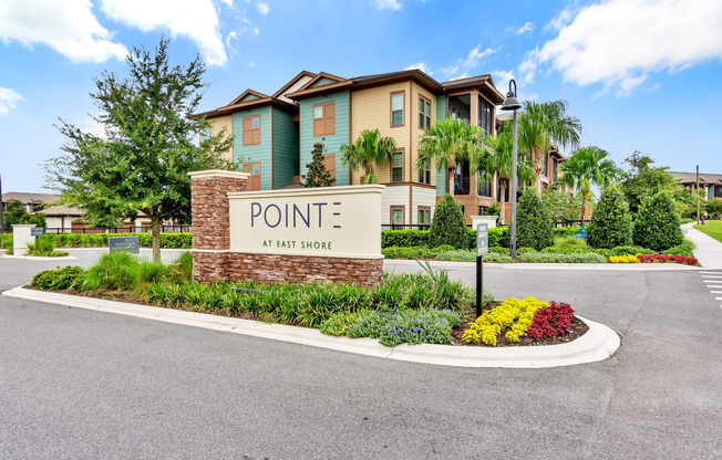 an image of the pointe at harrisonburg apartments with a sign that says pointe