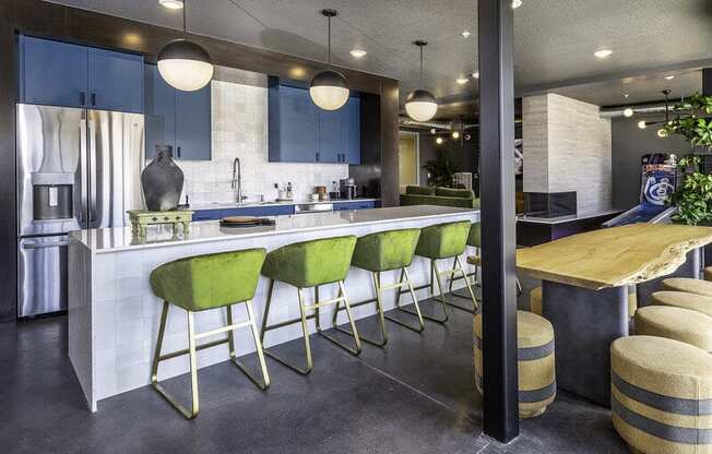 a  bar with green bar stools at Lotus Republic Apartments for rent in Downtown Salt Lake City, Utah