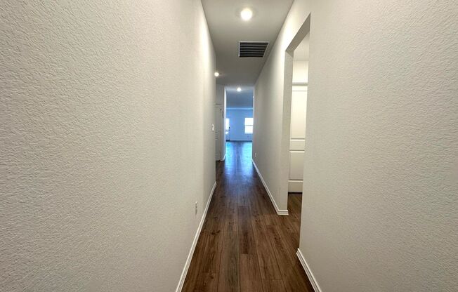 Two Primary Suites, 4 Bedrooms and 3 Bathroom Single Family Home for Rent in Desired Master Community in Kyle, Texas.