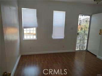 1305 W 56 ST