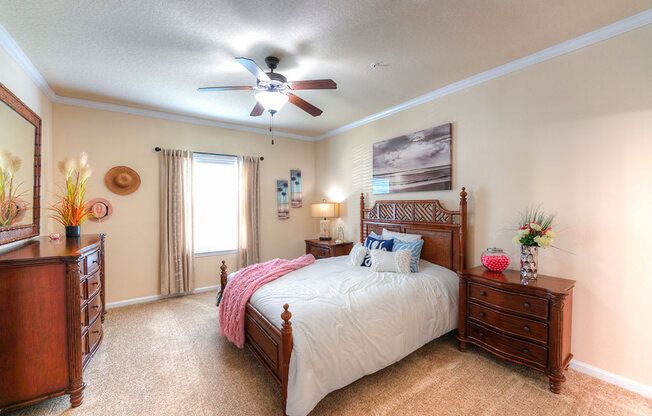 a bedroom with a large bed and a ceiling fan  at Cabana Club - Galleria Club, Florida