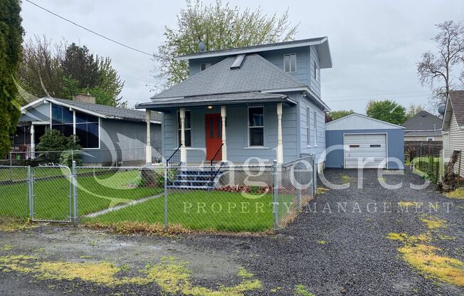 Charming 2 Bedroom Home With 1 Car Garage and A Covered Porch