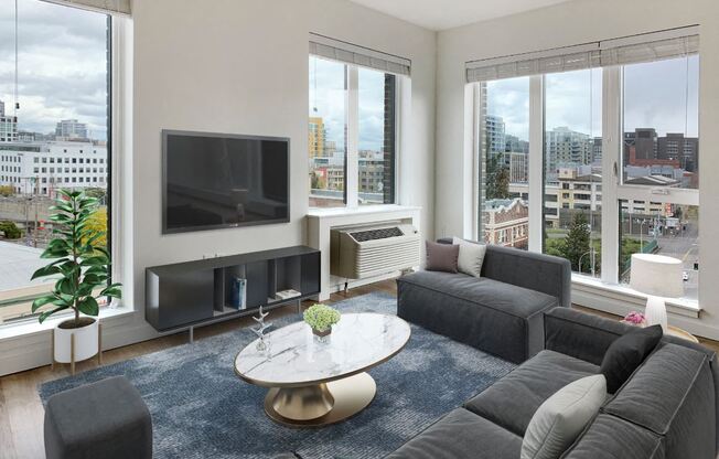 a living room with a couch and a coffee table and a television