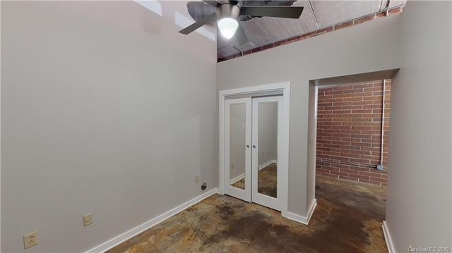 Awesome and modern loft condo for lease in Uptown Charlotte's tree lined Fourth Ward neighborhood!