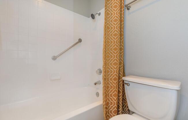 a close up of a shower in a small room