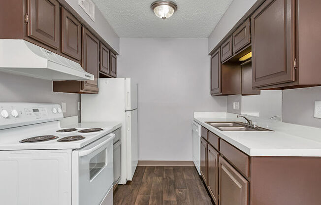 kitchens in Wichita apartments with nice cabinets