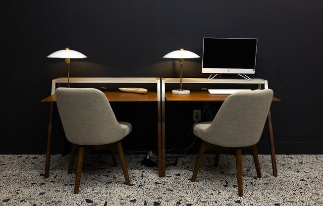 a desk with two chairs and a computer on it  at The Lady, South Carolina