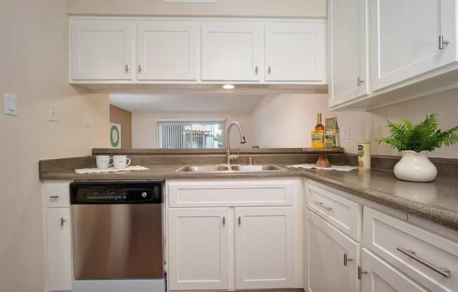 Granite Counter Tops, Coffee Cup In Kitchen at Wilbur Oaks Apartments, Thousand Oaks, CA, 91360