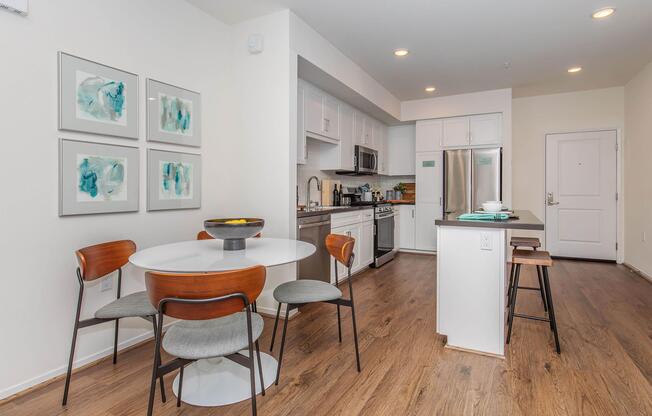 a kitchen with a table in a room
