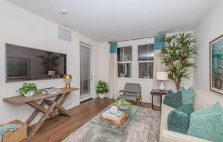 a living room filled with furniture and a fire place