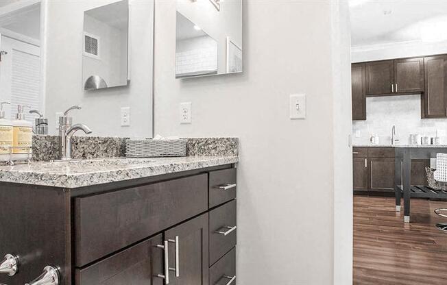 a kitchen with a sink and a counter top