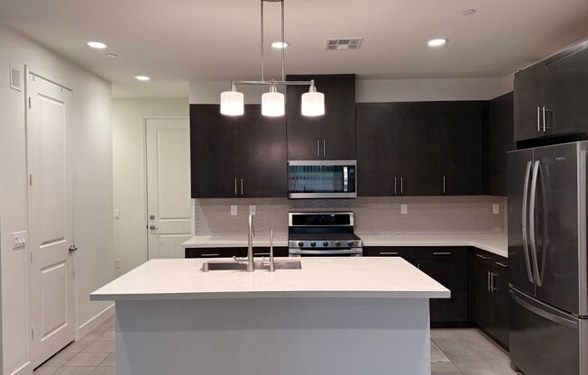Stunning 3-Bed/2.5-Bath End Unit Condo with Solar & Large Yard