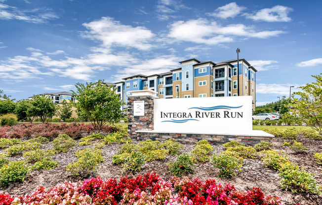 the infra river run sign in front of an apartment building
