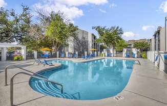 the swimming pool at the enclave apartments