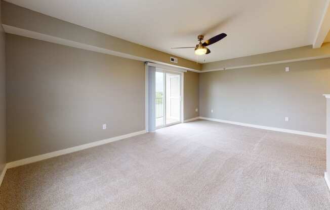 Enlarged Living Room at The Reserve at Destination Pointe in Grimes, IA with