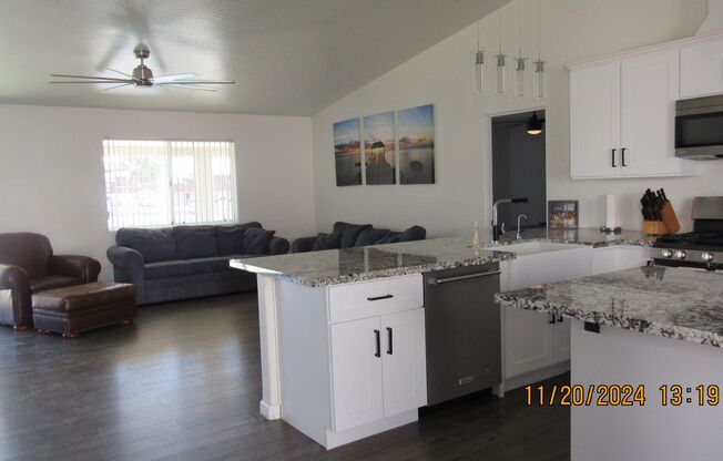 Refreshed 3 bedroom, 3 bath, 3 car boat deep garage with a pool