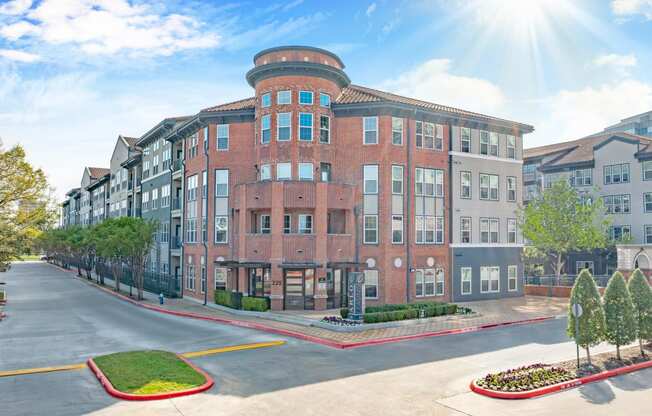 a rendering of an apartment building on a city street