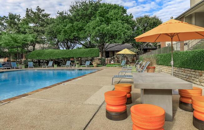 Oak Chase community pool with orange chairs