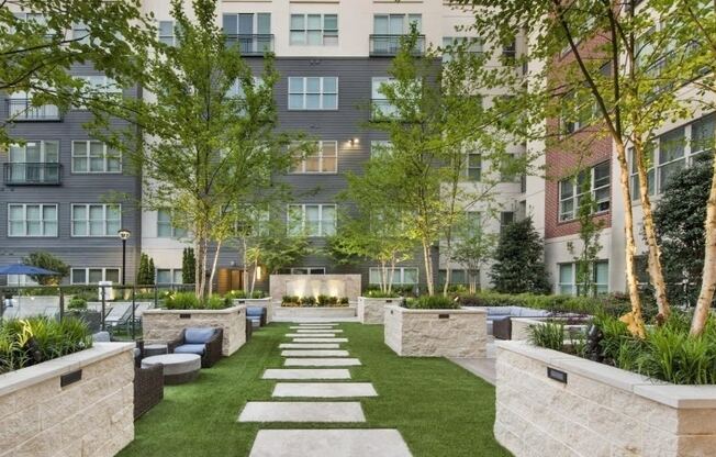 Arabelle Perimeter Luxury Apartments in Atlanta, GA 30328 photo of a courtyard with a fountain