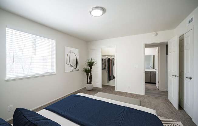 a bedroom with a large bed and a large window at Summit, Idaho