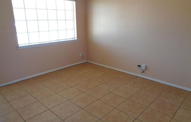 Cute Single Level Northeast Home With Refrigerated Air Located In Quiet Neighborhood
