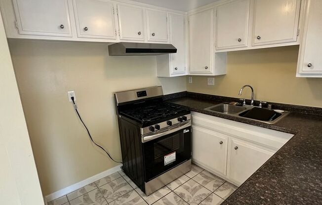 UPSTAIRS 1 BEDROOM CONDO FOR LEASE- GATED COMMUNITY