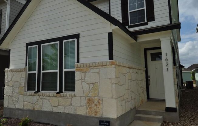 Enjoy a lock and leave lifestyle in this brand new cottage style home at The Retreat at Hero Way