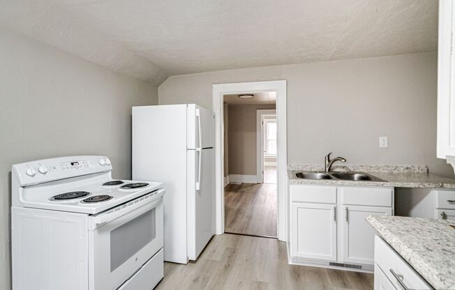 702 S. Commercial St / 109 Division St